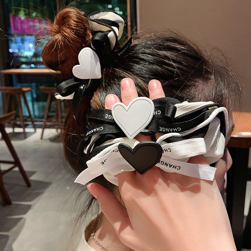 Bow knot peach heart hair rope PL52302